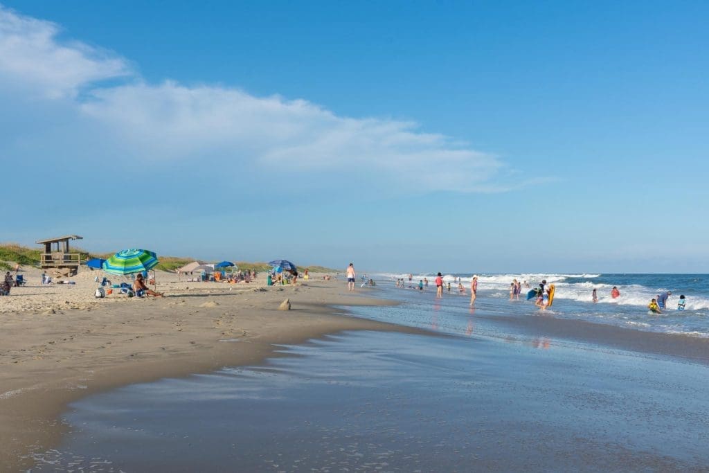 People swimming and surfing at Hatteras Island