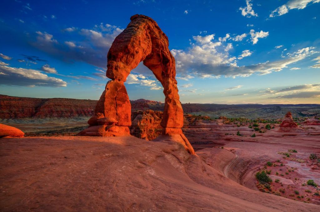 Scenic image of Delicate Arch at sunset.
