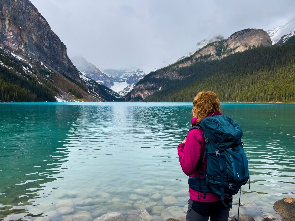 Summer,And,Young,Woman,In,Lake,Louise,Banff,National,Park,